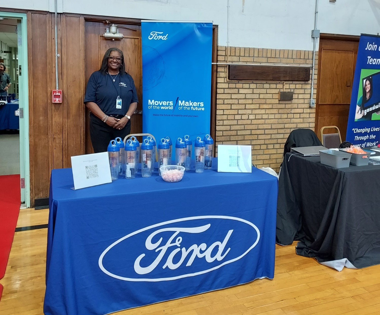 Ford employee recruiting at a table