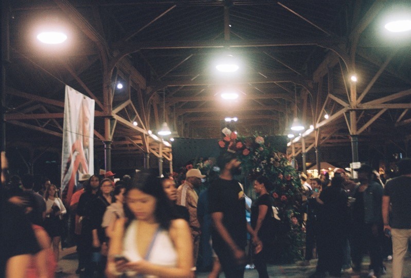 people wandering Eastern Market in Detroit