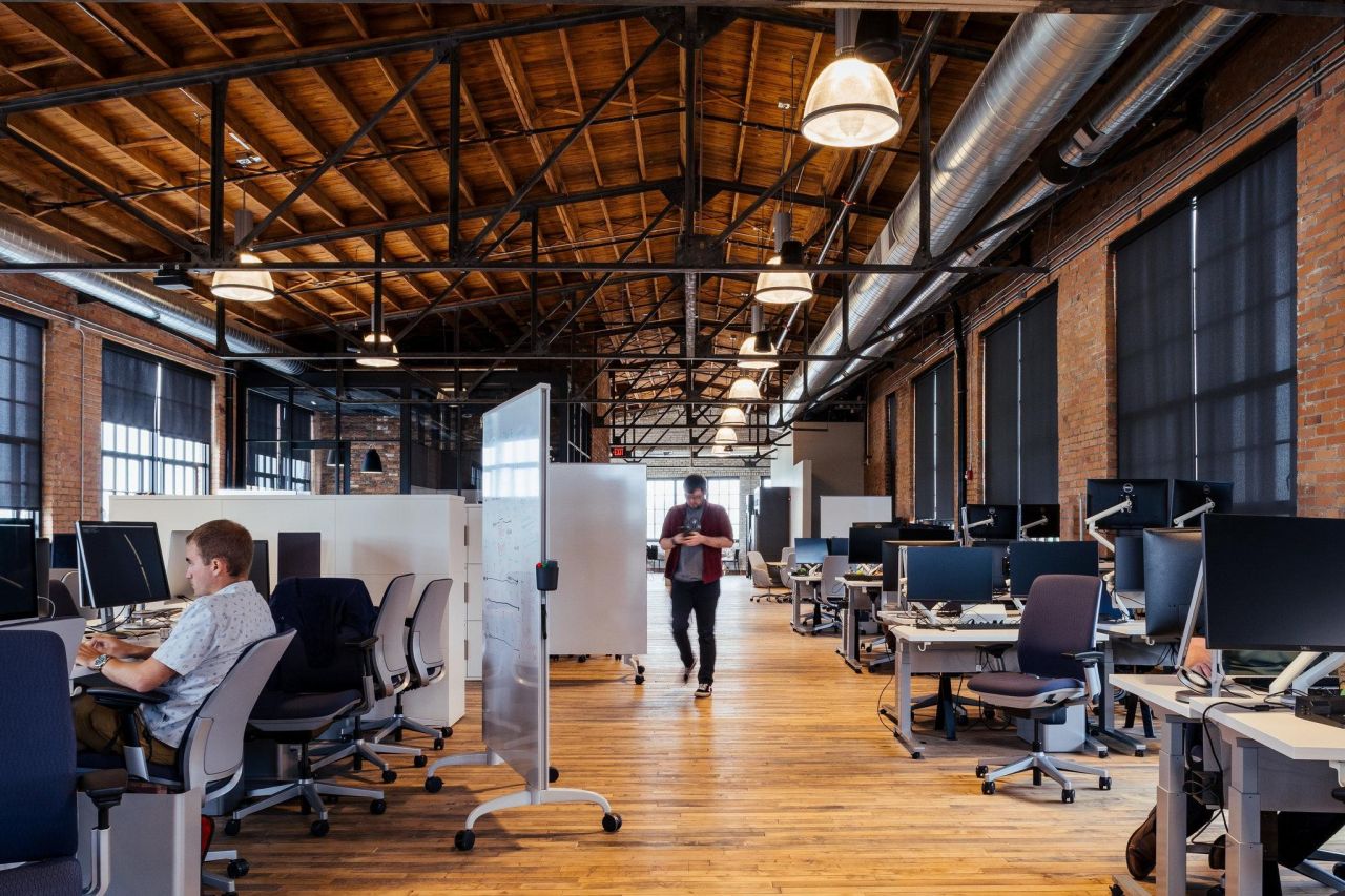 Interior photo of The Factory with Ford employees working