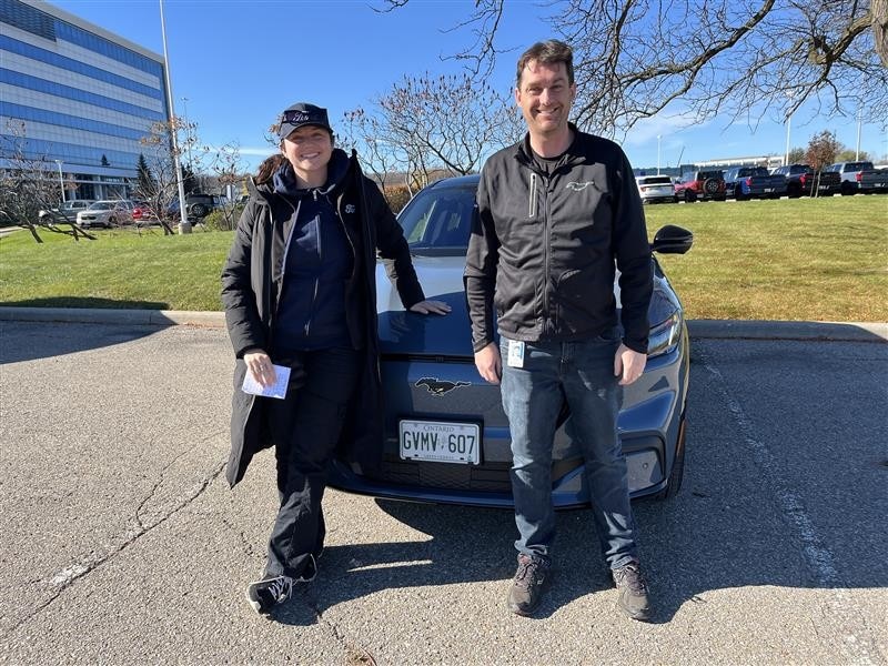 Employees at drive event program