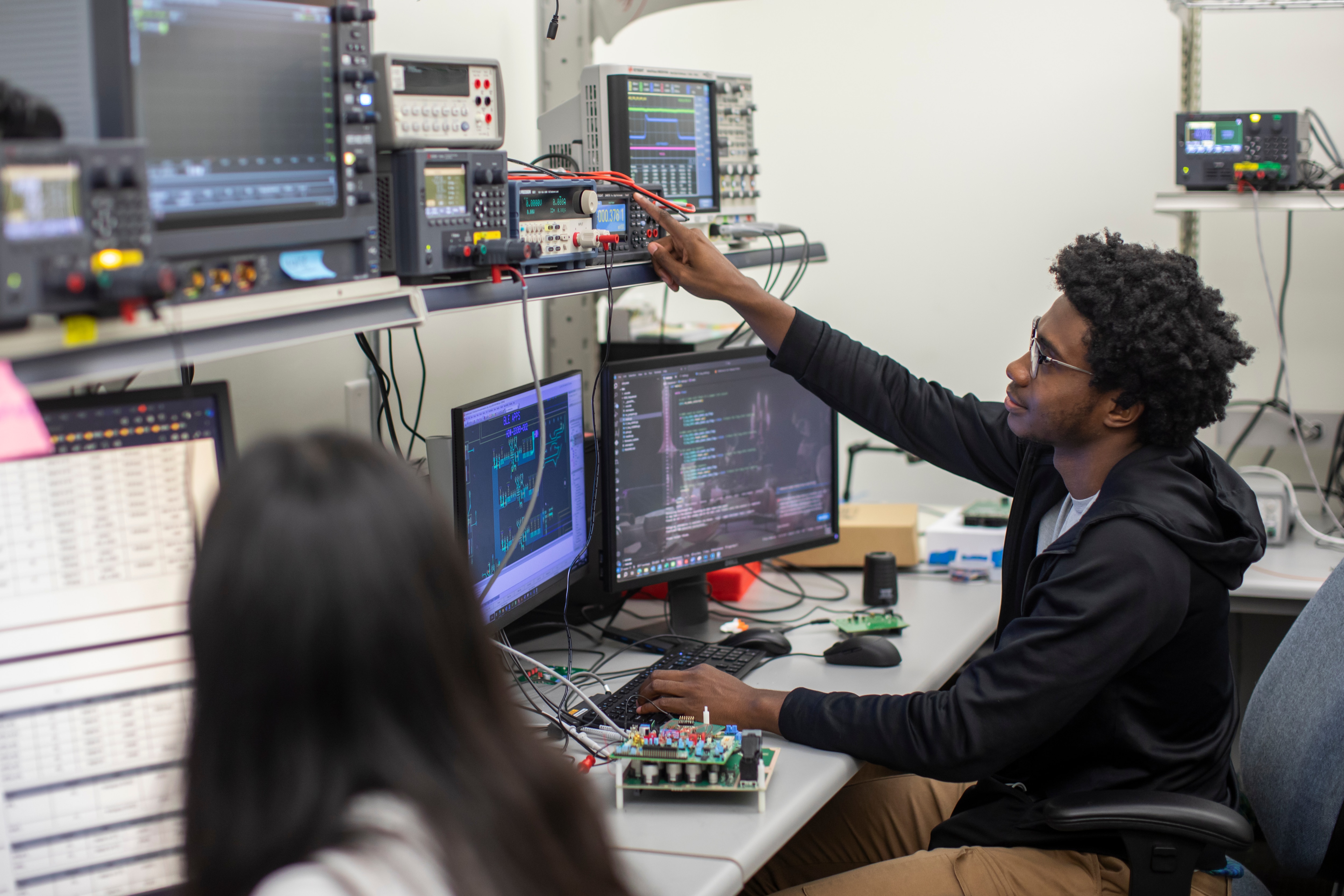 Ford engineers with their computers