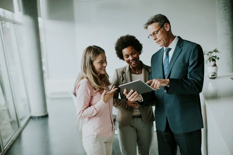 Employees standing and talking