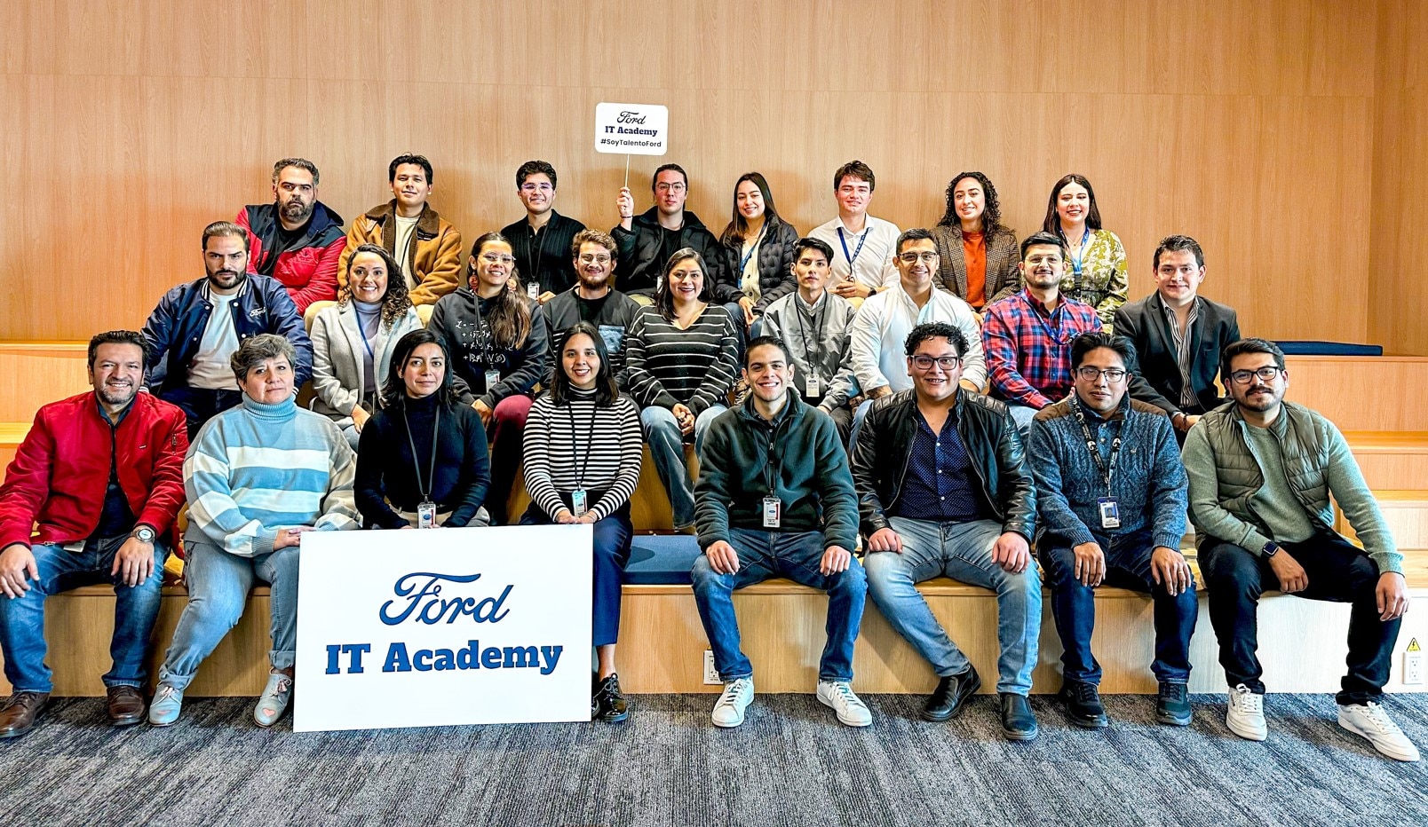Ford IT Academy Mexico logo featuring a modern design with the text "Ford IT Academy" and a stylized representation of Mexican students