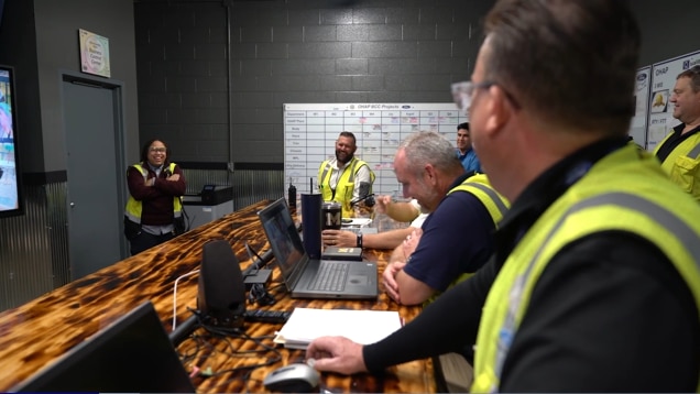 Process coaches at desk